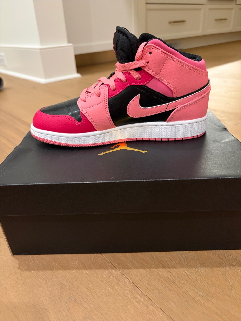 Nike Pink and Black Mid-Top Basketball Sneaker